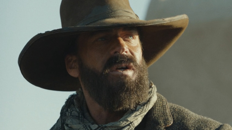 Charles Goodnight wearing a cowboy hat in "1883"