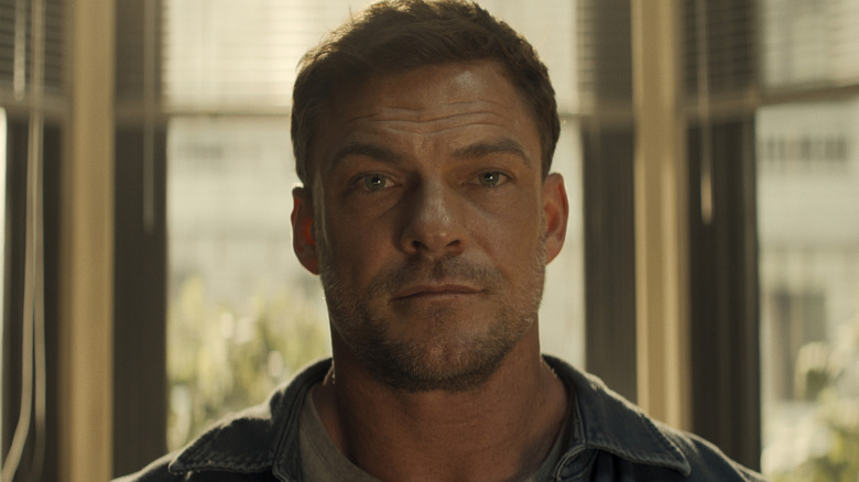 Jack Reacher looking at the camera in 