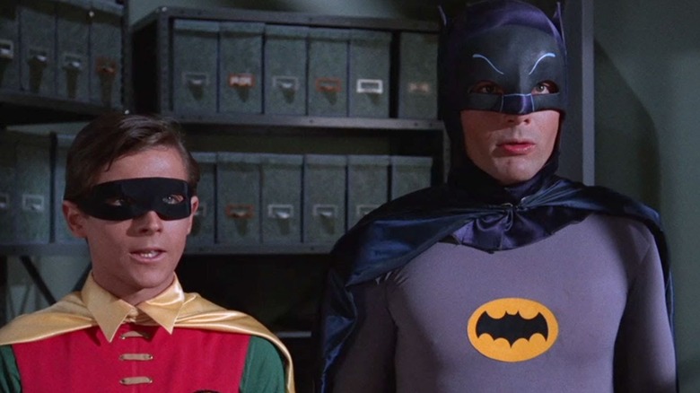 Burt Ward as Robin and Adam West as Batman, standing together in Batman.