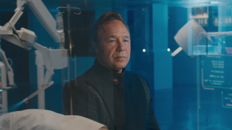Stephen Graham as Elias Mannix, observing a procedure in Bodies.