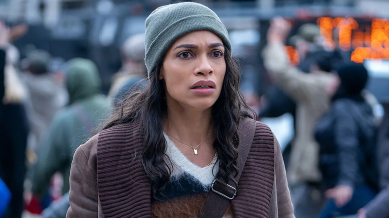 Rosario Dawson as Alma Ortega, appearing distraught in DMZ.
