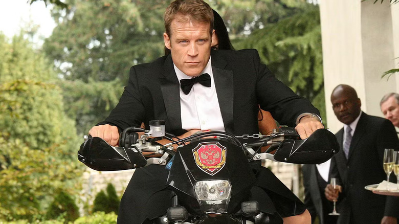 Mark Valley as Christopher Chance, riding a motorcycle in Human Target.