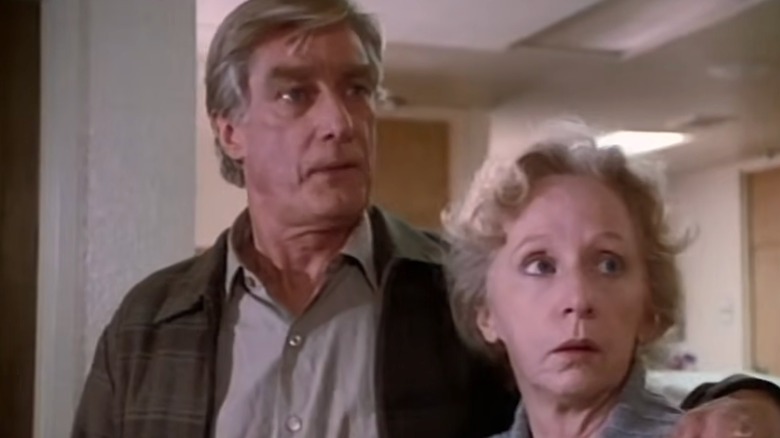 Ernie and Mary Ross standing in hospital hallway
