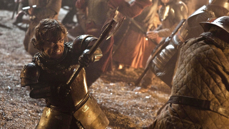 Tyrion Lannister (Peter Dinklage) fighting an enemy in Game of Thrones