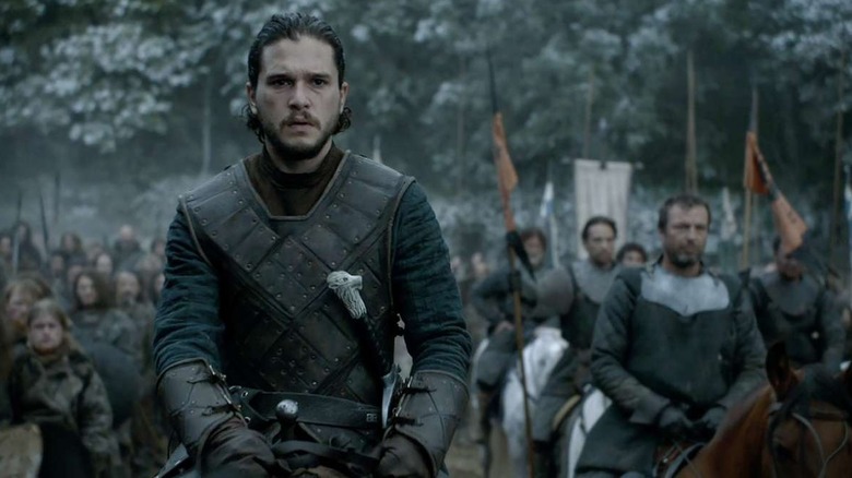 Kit Harington as Jon Snow sits on a horse before his army in Game of Thrones