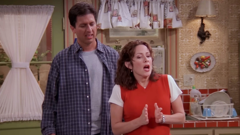 Ray Romano as Ray listens to Patricia Heaton as Debra n Everybody Loves Raymond