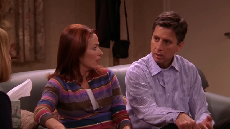 Patricia Heaton as Debra stares at Ray Romano as Ray in Everybody Loves Raymond