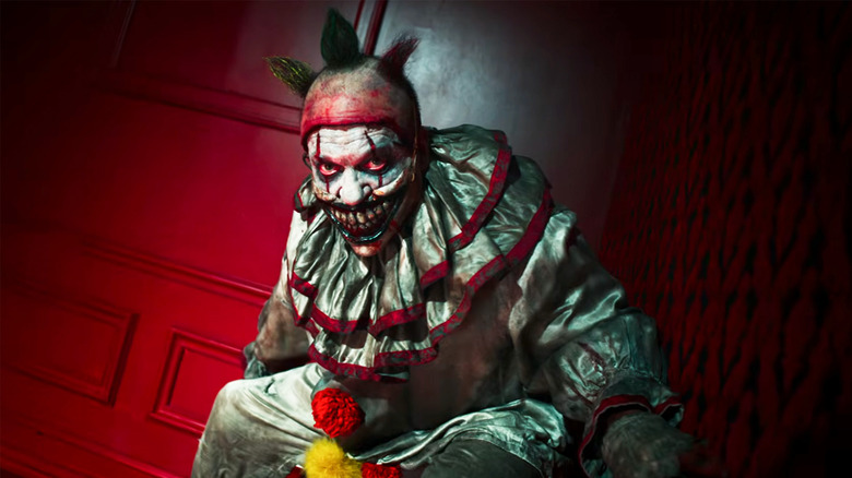 Twisty the Clown and Paul the Illustrated Seal in American Horror Story Freak Show