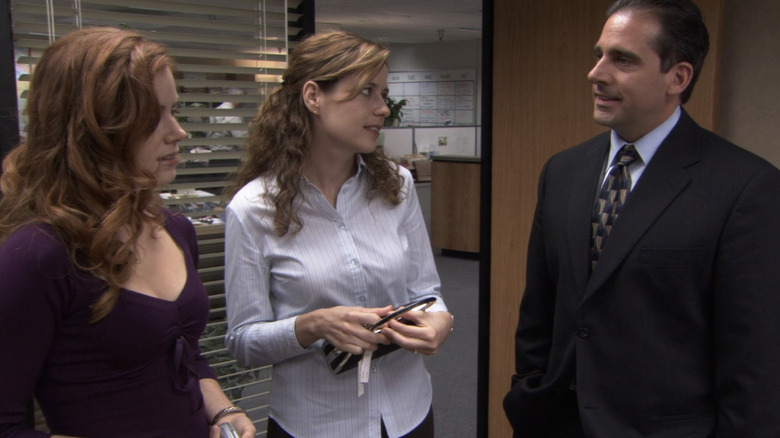 Katy Moore stands beside Pam Beesly and Michael Scott on The Office (2005-2013)