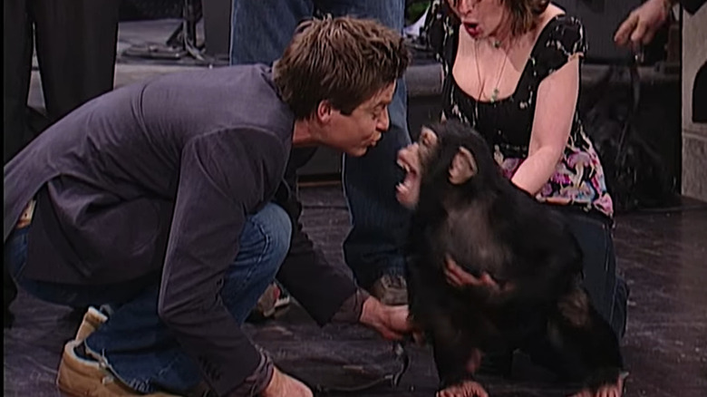 Jason Bateman kissing Mikey the chimp on SNL