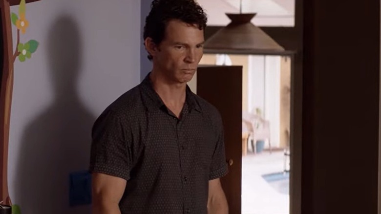 Pope standing in the Cody house in Animal Kingdom