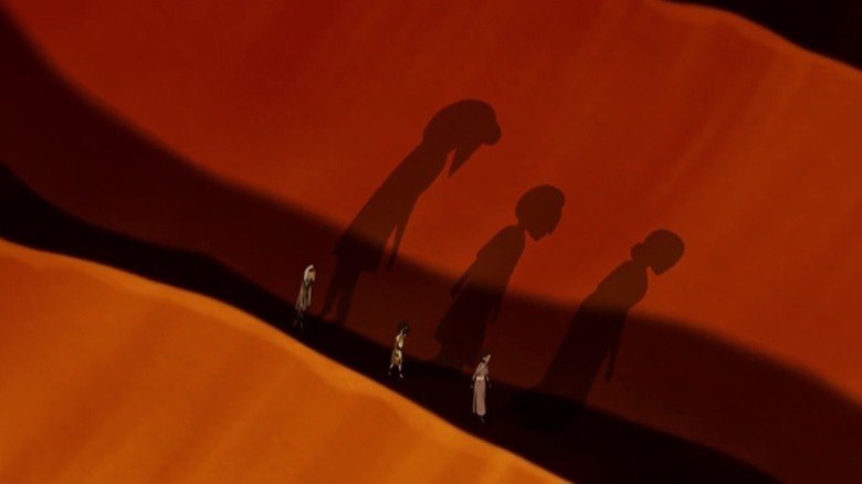 Katara, Toph, and Sokka with Momo on his head walking through the desert on Avatar: The Last Airbender S2E11