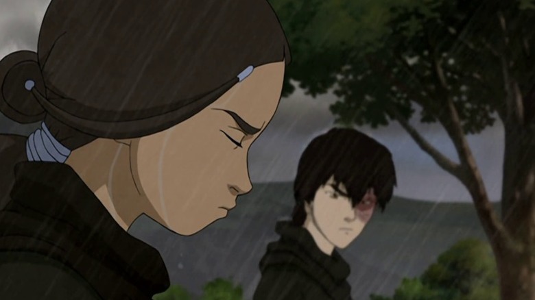 Katara standing in the rain with eyes closed while Zuko looks at her on Avatar: The Last Airbender S3E16