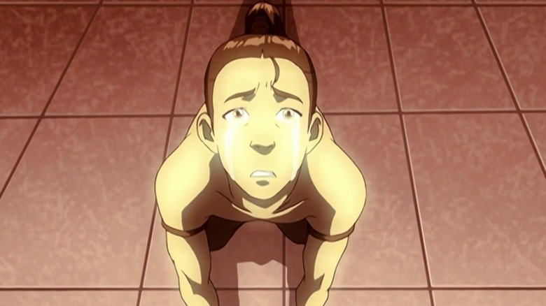 Young Zuko kneeling and looking up with tears in his eyes on Avatar: The Last Airbender S1E13