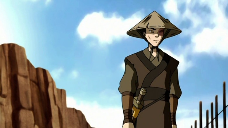 Zuko standing next to a fence on Avatar: The Last Airbender S2E7