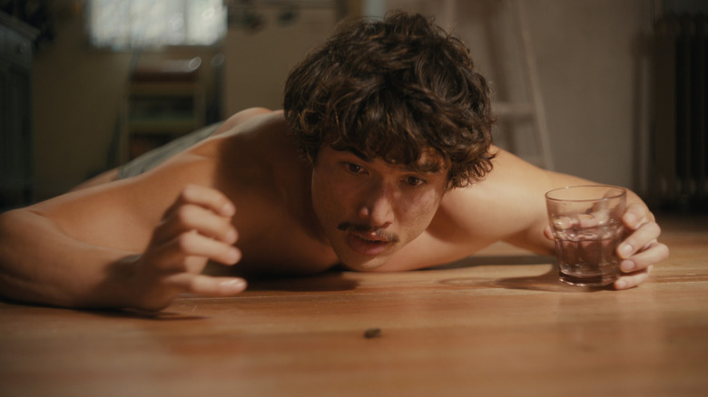 Charles Melton as Austin in Beef Season 2