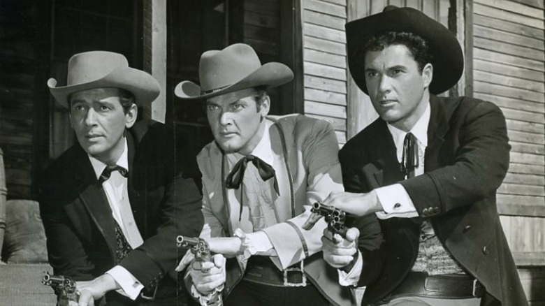 Jack Kelly, Roger Moore, and Robert Colbert as Bart, Beau, and Brent Maverick in a promotional image for "Maverick."