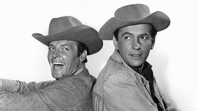 Roger Moore and Jack Kelly as Beau and Bart Maverick on set of "Maverick."