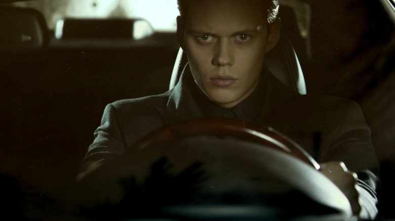 Bill Skarsgård driving a car in Hemlock Grove