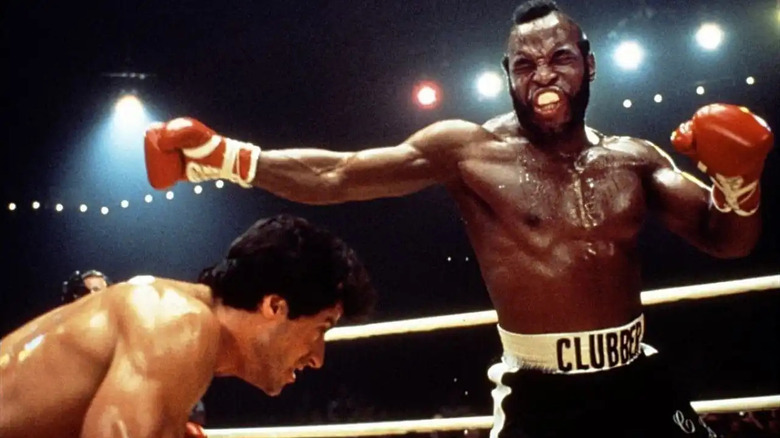 Clubber Lang takes a swing at Rocky Balboa in the boxing ring in Rocky III.