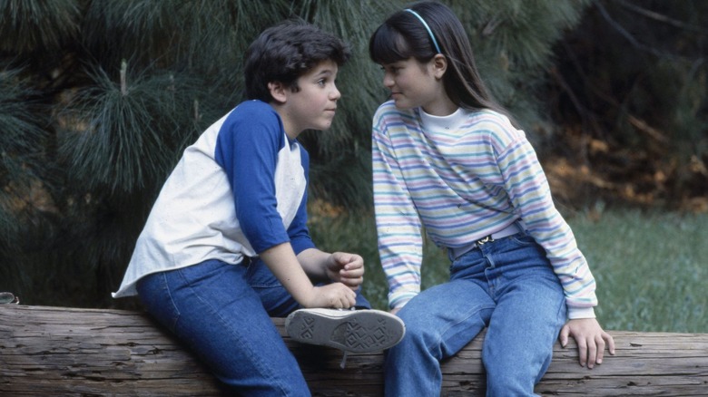 Kevin and Winnie sitting on log