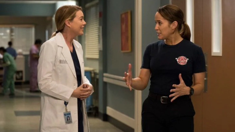 Meredith Grey (Ellen Pompeo) speaks with Andy Herrera (Jaina Lee Ortiz) in Grey's Anatomy