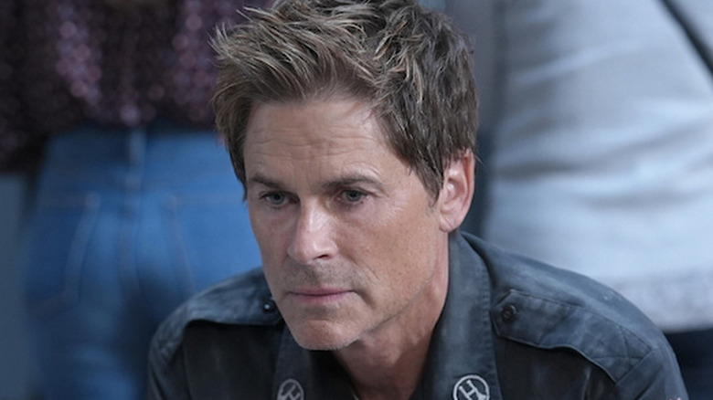 Rob Lowe as Owen Strand in blue firefighter uniform in 9-1-1: Lone Star