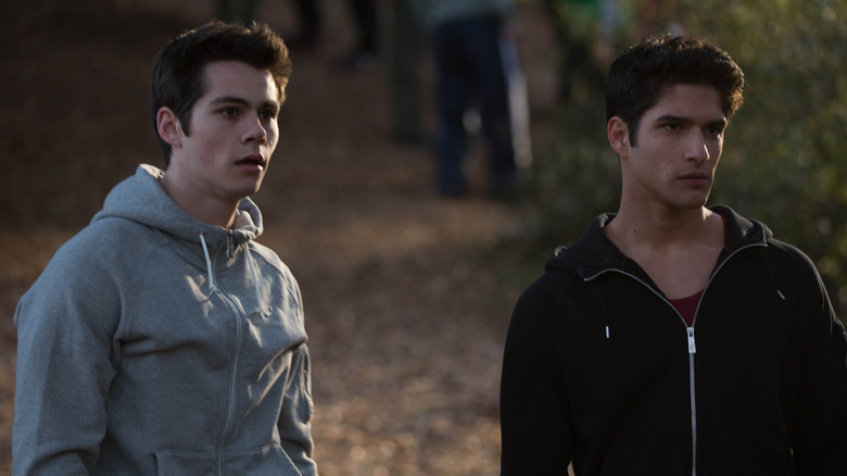 Stiles and Scott standing outside