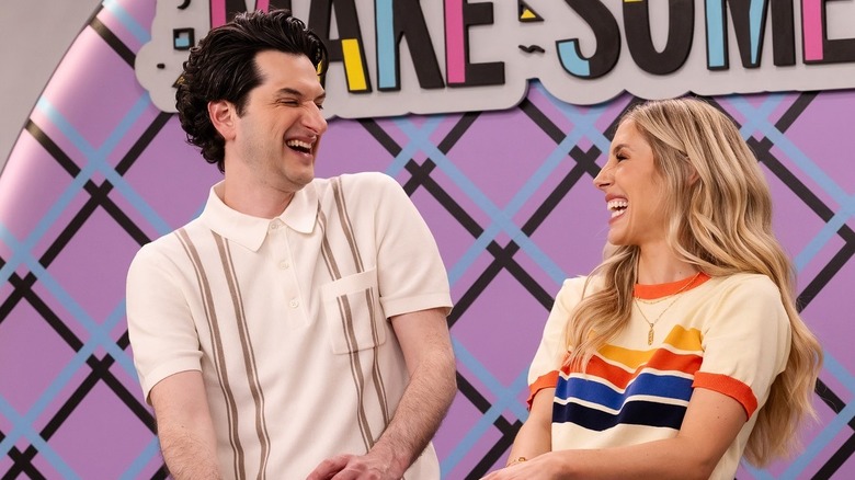 Ben Schwartz and Lisa Gilroy laughing on the set of Make Some Noise