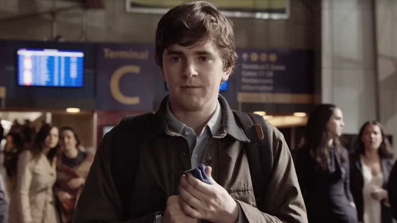 Freddie Highmore as Dr. Shaun Murphy holds a napkin in The Good Doctor