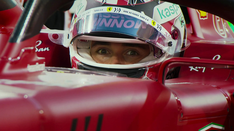 Charles Leclerc peers through his helmet in Formula 1: Drive to Survive.