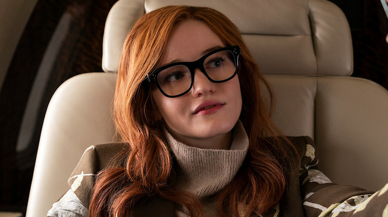 Anna Delvey isits on  private jet.