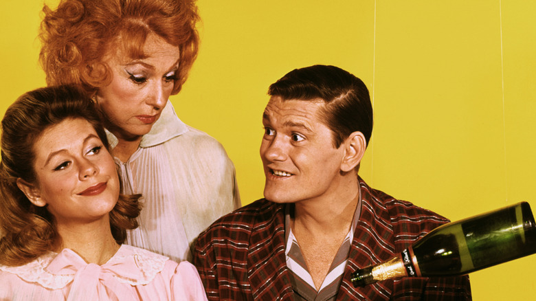 Elizabeth Montgomery as Samantha, Agnes Moorehead as Endora, and Dick York as Darrin in a publicity image for Bewitched.