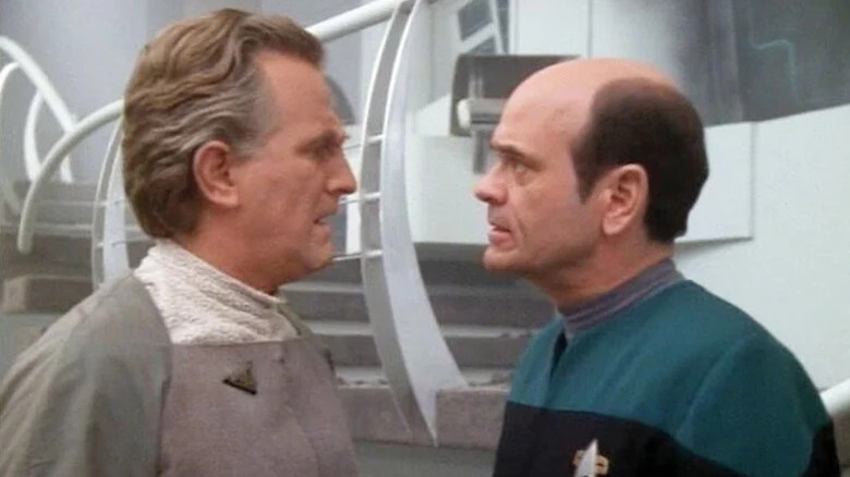 Henry Woronicz's Quarren facing off with Robert Picardo's Doctor on Star Trek: Voyager
