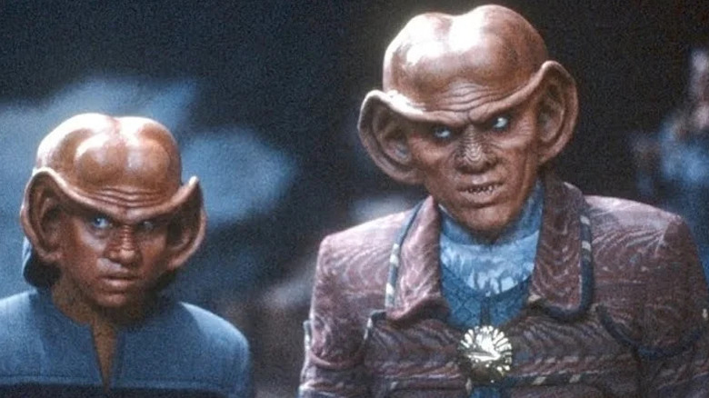 Aron Eisenberg's Nog and Armin Shimerman's Quark looking attentive on Star Trek: Deep Space Nine
