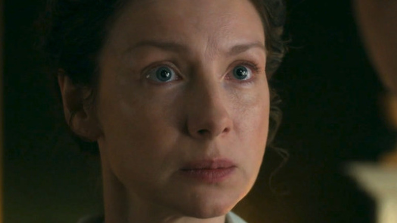 Claire (Caitríona Balfe) stares someone down in Outlander