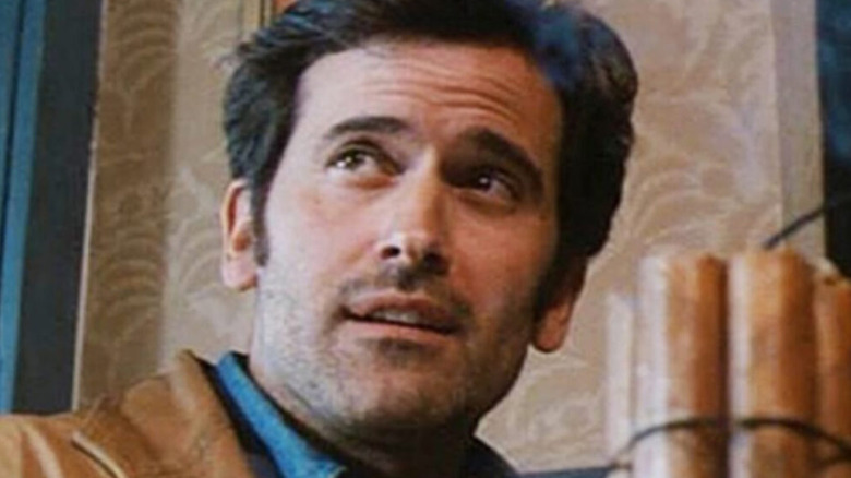 Brisco County, Jr. (Bruce Campbell) is unfazed by dynamite in The Adventures of Brisco County, Jr.