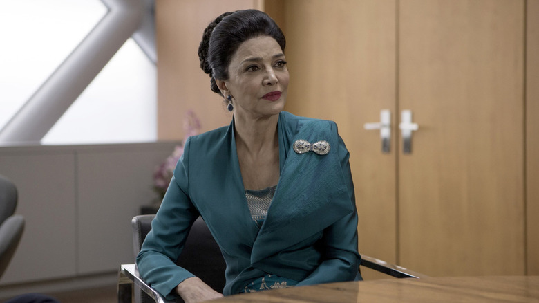 Shohreh Aghdashloo as Chrisjen Avasarala wearing a blue suit in The Expanse