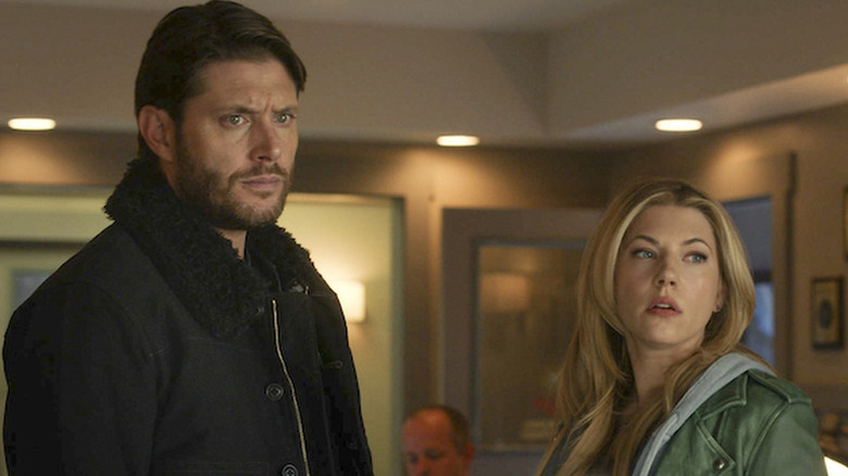 Beau Arlen (Jensen Ackles) and Jenny Hoyt (Kathryn Winnick) stand next to each other in Big Sky