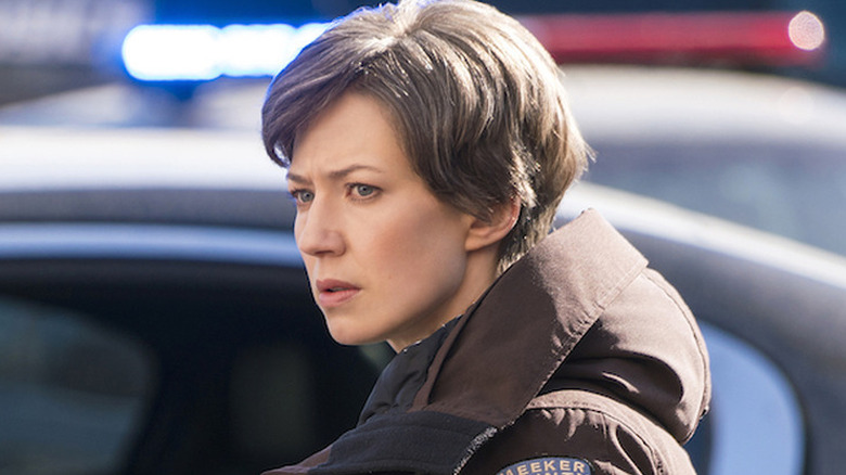 Carrie Coon wearing brown police jacket in Fargo