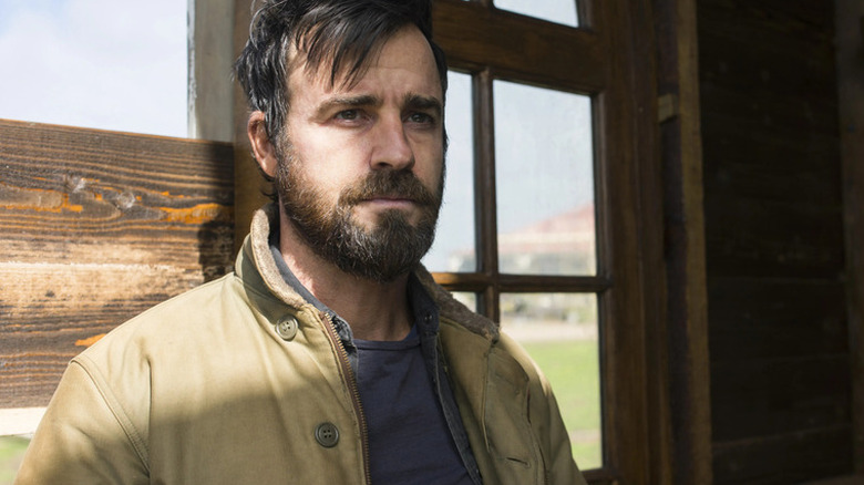 Justin Theroux as Kevin Garvey standing in front of door in The Leftovers