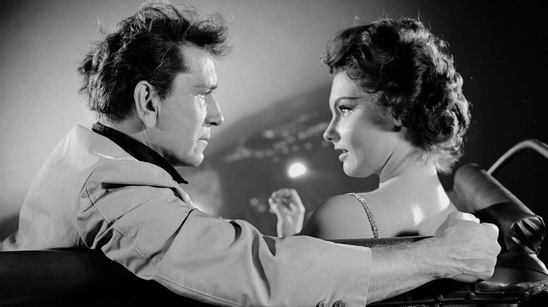 Edward Hall (Richard Conte) looks at Maya (Suzanne Lloyd) while on a ride in The Twilight Zone (1959)