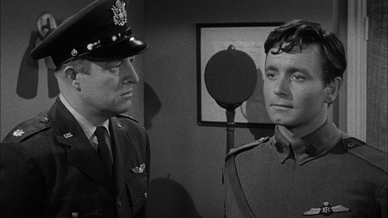 Major Wilson (Simon Scott) looks closely at Terry Decker (Kenneth Haig) in The Twilight Zone (1959)