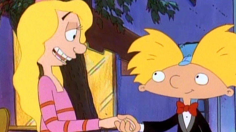 Helga and Arnold holding hands at fancy restaurant in Hey Arnold