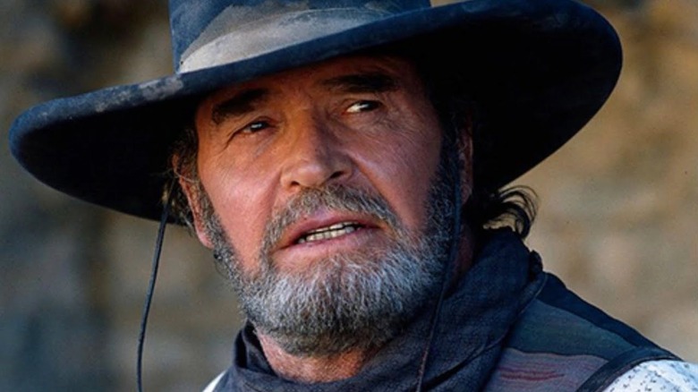 Woodrow Call (James Garner) looks inquisitively to his left in Streets of Laredo