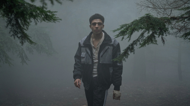 Jay Lycurgo's Nathan Byrne walking in the mist on Half Bad: The Bastard Son & The Devil Himself