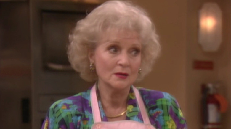 Rose Nylund looking at someone skeptically off camera
