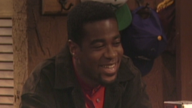 Alex Désert as Mr. Williams smiling at sitting in Season 3 of Boy Meets World