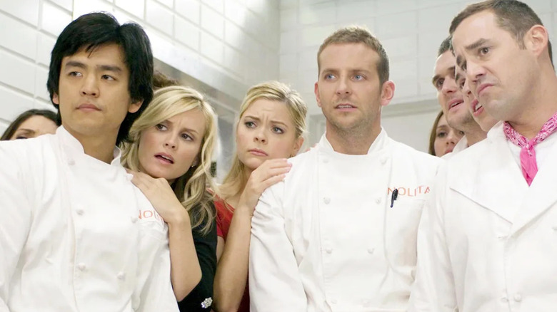 Jack Bourdain (Bradley Cooper) and the rest of his Nolita staff stand together in "Kitchen Confidential"