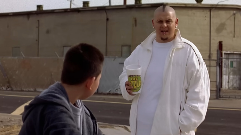 Rodney Rush as Combo, holding a cup in Breaking Bad.